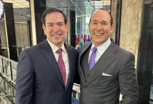 Secretary of State Marco Rubio and EWTN host Raymond Arroyo pose for a photo before the interview on August 7, 2025.