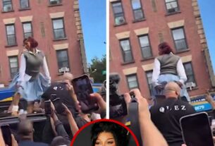 Cardi B twerks em cima do carro enquanto os fãs enxameiam o evento pop-up