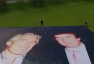Foto gigante de Trump e Epstein é exposta em Windsor