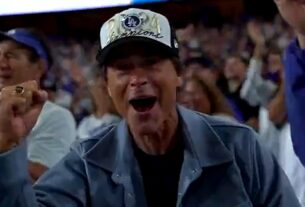 Rob Lowe criticado pelos fãs do Reds por aplaudir Dodgers no jogo de playoff